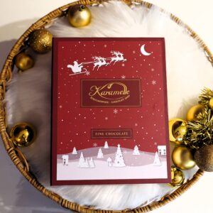 24 käsitöökommiga punane jõulude raamat